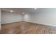 Spacious unfinished basement with light wood-look flooring at 230 Hamrick Rd # 2, Cramerton, NC 28032
