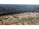 Aerial view of new home construction and roads at 8631 Frank Grier Rd # 6, Charlotte, NC 28215