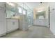 Elegant bathroom with double vanity, large shower, and marble-look tile at 8631 Frank Grier Rd # 6, Charlotte, NC 28215