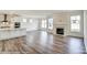 Modern kitchen with white cabinets and stainless steel appliances at 8631 Frank Grier Rd # 6, Charlotte, NC 28215