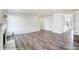 Open living space with hardwood floors and fireplace at 8631 Frank Grier Rd # 6, Charlotte, NC 28215