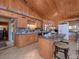 Rustic kitchen with wood cabinets and a breakfast bar at 6860 Shade Tree Ln, Sherrills Ford, NC 28673