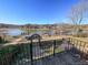 Lake view from balcony with stone railing at 6860 Shade Tree Ln, Sherrills Ford, NC 28673