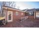 Brick home with patio, access to basement, and landscaping at 3616 County Home Rd, Conover, NC 28613