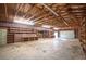 Large garage with shelving and high ceilings at 3616 County Home Rd, Conover, NC 28613