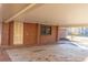 Covered carport with brick exterior and concrete flooring at 3616 County Home Rd, Conover, NC 28613