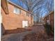 Brick garage with white door and paver patio at 3616 County Home Rd, Conover, NC 28613