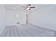 Bedroom with ceiling fan, carpet, and en-suite bathroom at 105 Megby Trl, Statesville, NC 28677