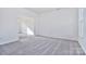Spacious office with carpeted floors and view into another room at 105 Megby Trl, Statesville, NC 28677