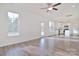 Spacious living room with hardwood floors and kitchen view at 105 Megby Trl, Statesville, NC 28677