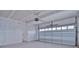 Unfinished two-car garage with an automatic garage door opener at 105 Megby Trl, Statesville, NC 28677
