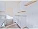 Kitchen boasts white cabinets and granite countertops at 105 Megby Trl, Statesville, NC 28677