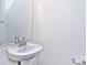 Simple bathroom with pedestal sink and mirror at 105 Megby Trl, Statesville, NC 28677