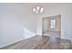 Formal dining room with hardwood floors and chandelier at 105 Megby Trl, Statesville, NC 28677