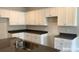 Modern kitchen with white cabinets and dark countertops at 2773 Ruby Mill Dr # 41, Gastonia, NC 28056