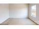 Bright bedroom with carpeted floors and window at 2773 Ruby Mill Dr # 41, Gastonia, NC 28056