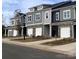 Townhomes with gray siding and two-car garages at 2773 Ruby Mill Dr # 41, Gastonia, NC 28056
