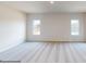 Large bedroom with two windows and carpeted floor at 2773 Ruby Mill Dr # 41, Gastonia, NC 28056