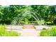 Ornamental fountain with arched water jets and lush landscaping at 2773 Ruby Mill Dr # 41, Gastonia, NC 28056