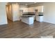 Modern kitchen with island, white cabinets, and dark countertops at 2773 Ruby Mill Dr # 41, Gastonia, NC 28056