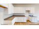 White kitchen cabinets and granite countertops at 2773 Ruby Mill Dr # 41, Gastonia, NC 28056