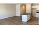 Open concept kitchen with island and hardwood floors at 2773 Ruby Mill Dr # 41, Gastonia, NC 28056