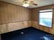 Bedroom with leopard print wallpaper and dark carpeting at 60 Shadowwood Dr, Taylorsville, NC 28681