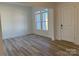 Bright living room with hardwood floors and natural light at 5217 Glenwalk Dr # 0059, Charlotte, NC 28269