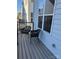 Private deck with two chairs, offering a relaxing outdoor space at 1438 Hamilton St # 15, Charlotte, NC 28206