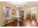 Small dining area with granite table and access to back door at 105 Collenton Ln, Mooresville, NC 28115