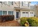 Front entryway of a two-story house with double garage at 105 Collenton Ln, Mooresville, NC 28115