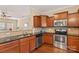 Modern kitchen features stainless steel appliances and granite countertops at 105 Collenton Ln, Mooresville, NC 28115