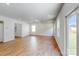 Spacious living room with hardwood floors and backyard access at 224 Winford Dr, Troutman, NC 28116