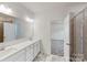 Modern bathroom with double vanity and shower at 224 Winford Dr, Troutman, NC 28116