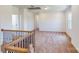 Loft area with carpeted floor and window overlooking the home's interior at 224 Winford Dr, Troutman, NC 28116