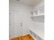 Mudroom with built-in bench, cubbies, and hooks at 224 Winford Dr, Troutman, NC 28116