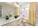 Modern bathroom with double vanity, bathtub, and stylish chevron tile at 4062 Red Gate Ave # 4, Harrisburg, NC 28075