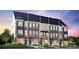 Three story townhome exterior, neutral color palette at 1424 Hamilton St # 12, Charlotte, NC 28206