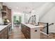 Modern kitchen with island and stainless steel appliances at 1424 Hamilton St # 12, Charlotte, NC 28206