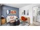 Stylish office space with blue accent wall, comfortable seating, and work area at 1424 Hamilton St # 12, Charlotte, NC 28206