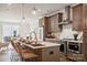 Open concept kitchen with large island and modern finishes at 1424 Hamilton St # 12, Charlotte, NC 28206