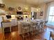 Modern kitchen with white cabinets, center island, and hardwood floors at 902 N Ashe Ave, Newton, NC 28658
