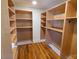 Large walk-in closet with ample shelving and hanging space at 902 N Ashe Ave, Newton, NC 28658