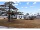 Single wide mobile home with front porch and large tree at 3430 Potneck Rd, Salisbury, NC 28147