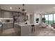 Modern kitchen with island and stainless steel appliances at 9901 Benfield Rd # 109, Charlotte, NC 28269