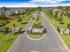 Aerial view of community entrance and homes at 2313 Loire Valley Dr, Fort Mill, SC 29707