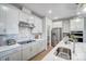 Modern kitchen with stainless steel appliances and an island at 4819 Wolf Pond Rd, Monroe, NC 28112