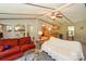 Open living room with red couch and view of kitchen at 4115 Cascade St, Terrell, NC 28682