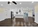 Open living area with hardwood floors and kitchen views at 533 Amon Ln, Pineville, NC 28134