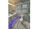 Elegant bathroom with double vanity, marble floors, and modern fixtures at 533 Amon Ln, Pineville, NC 28134